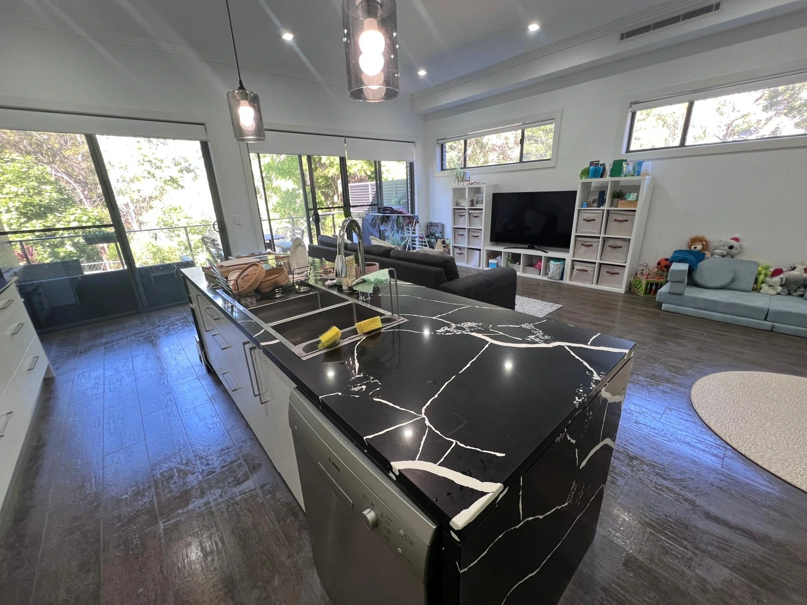 Professional house cleaner working in a Sydney home